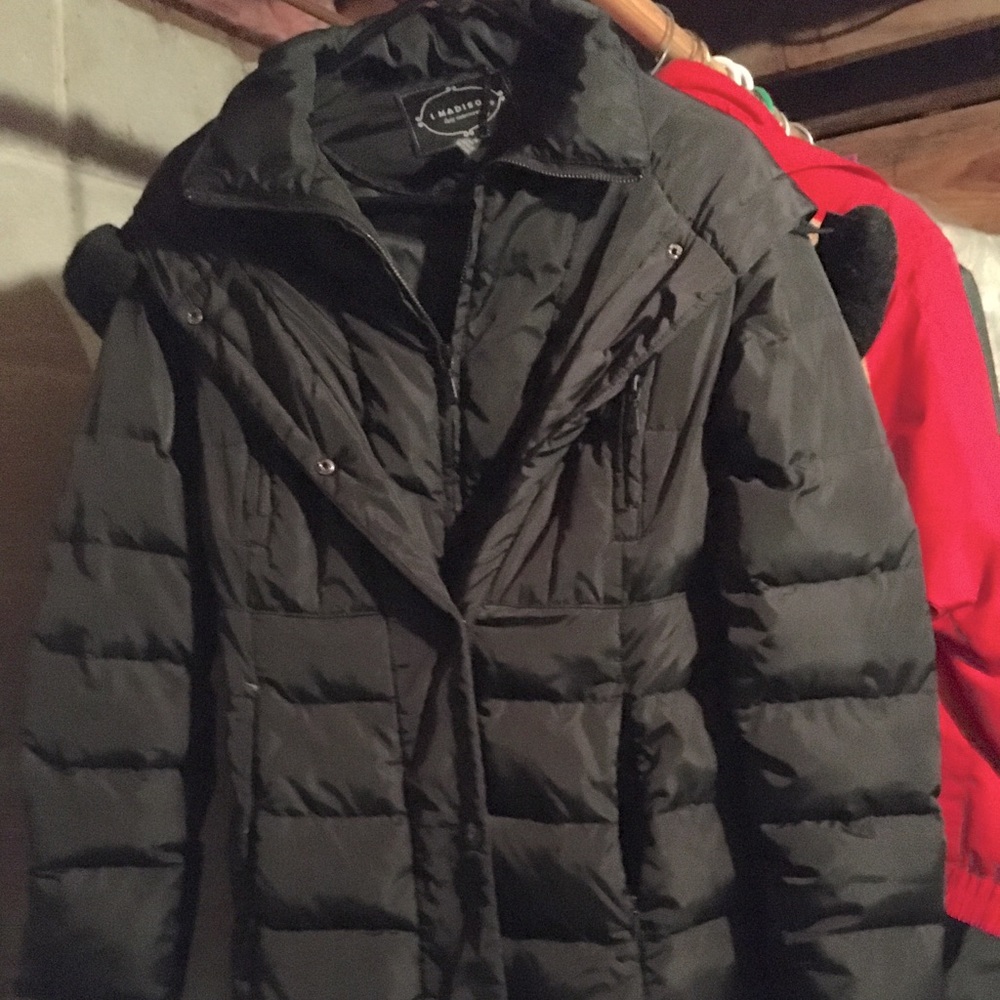 Black puffer coat with hood and black faux fur trim. Mid length.